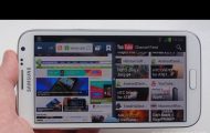 Samsung Galaxy Note 2 - Hand Holding White Samsung Galaxy Note 2 Multi Window Feature - Droid Views