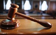 U.S. Court Dismisses Apple's Patent Lawsuit against Motorola - Gavel Placed On Top Of The Table - Droid Views