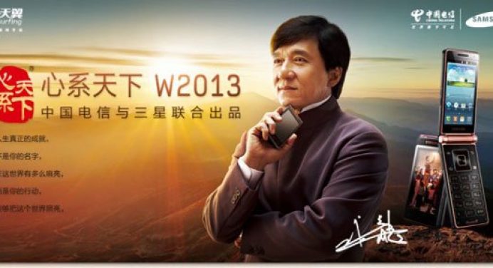 A Simple Little Hack Enables LTE on Google Nexus 4 - Jackie Chan Holding Samsung W2013 - Droid Views