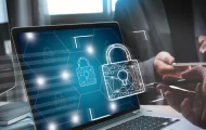 Laptop with a virtual lock, representing cyber security