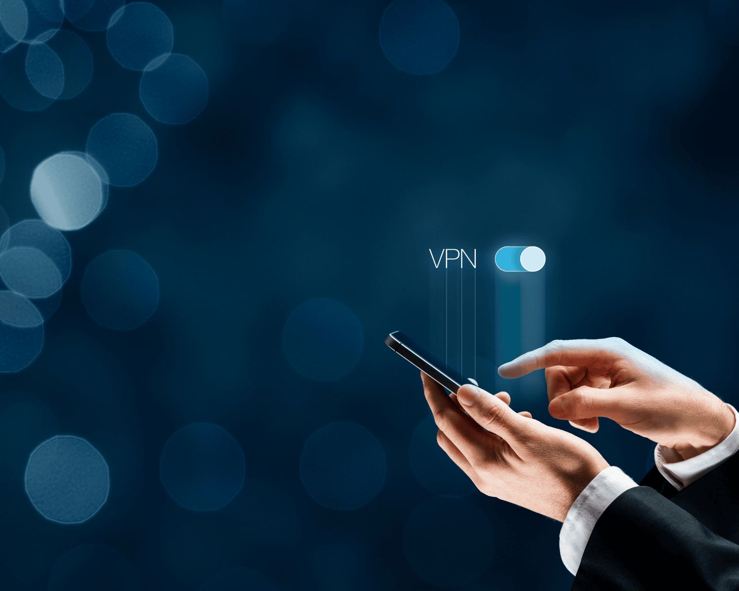Man holding a phone with the words "VPN" hovering above.
